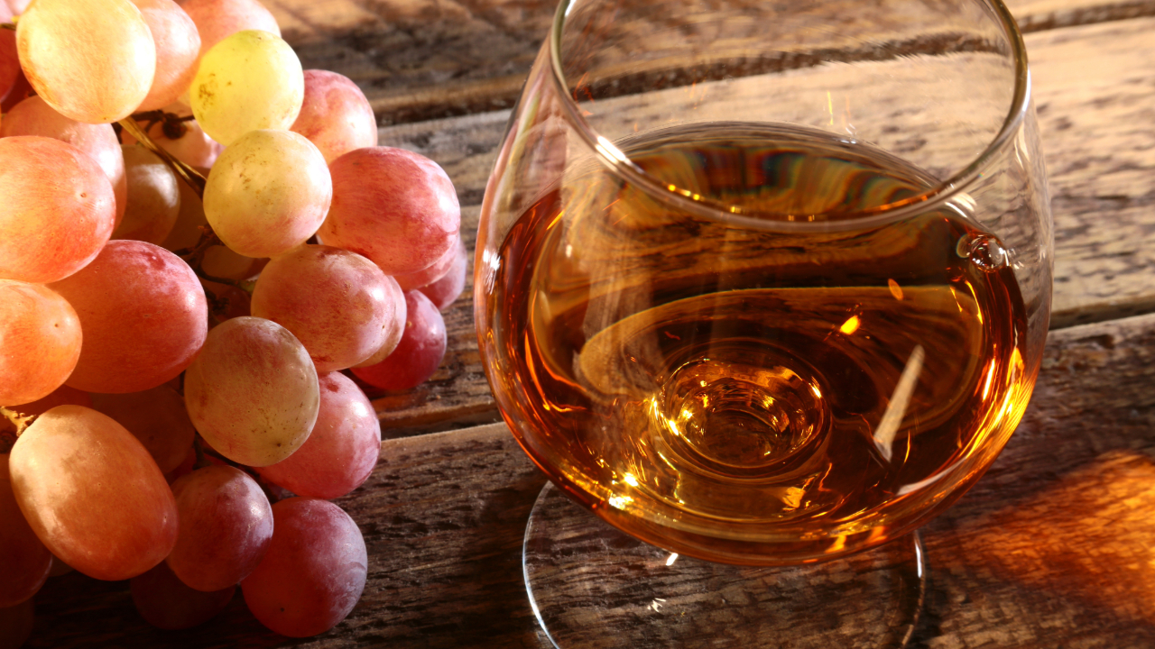 A glass of brandy with fruit at an intimate celebration