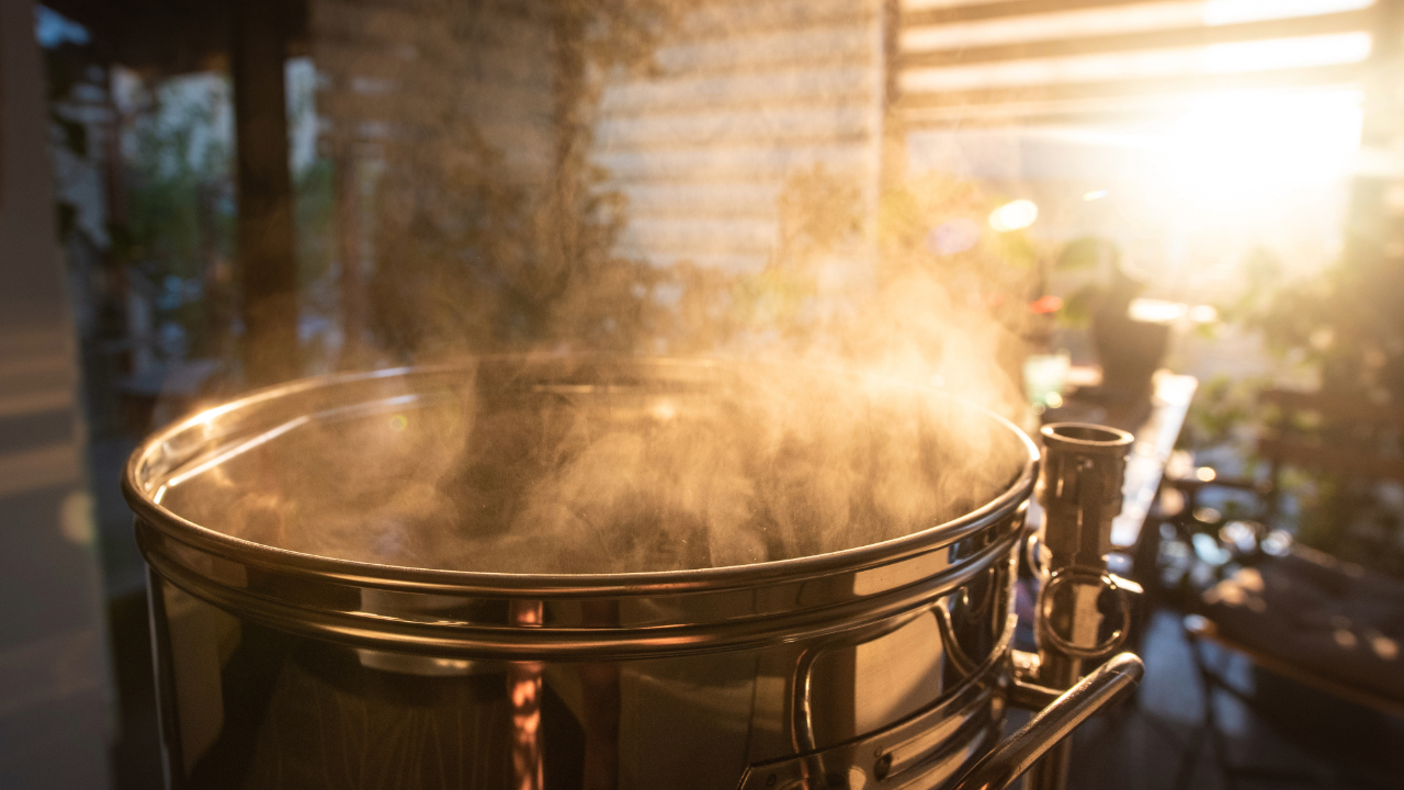 A pot for homebrewing bubbling and steaming
