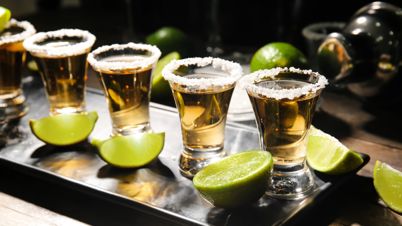 Shots of Tequila with salt and lime for a vibrant celebratory drink