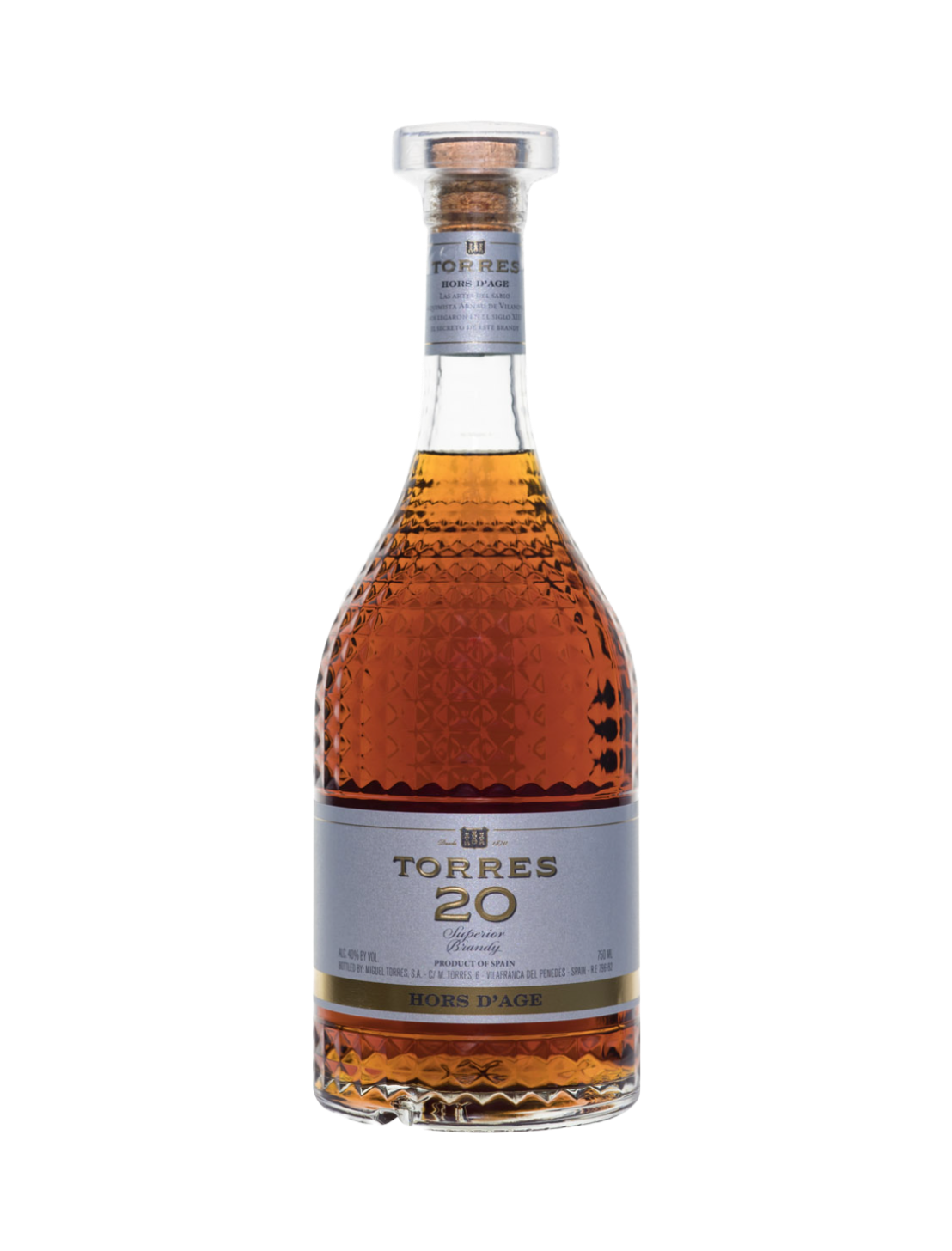 Elegant brandy bottle with dark amber hue, hinting at rich vanilla, cinnamon, and nutmeg flavors within.